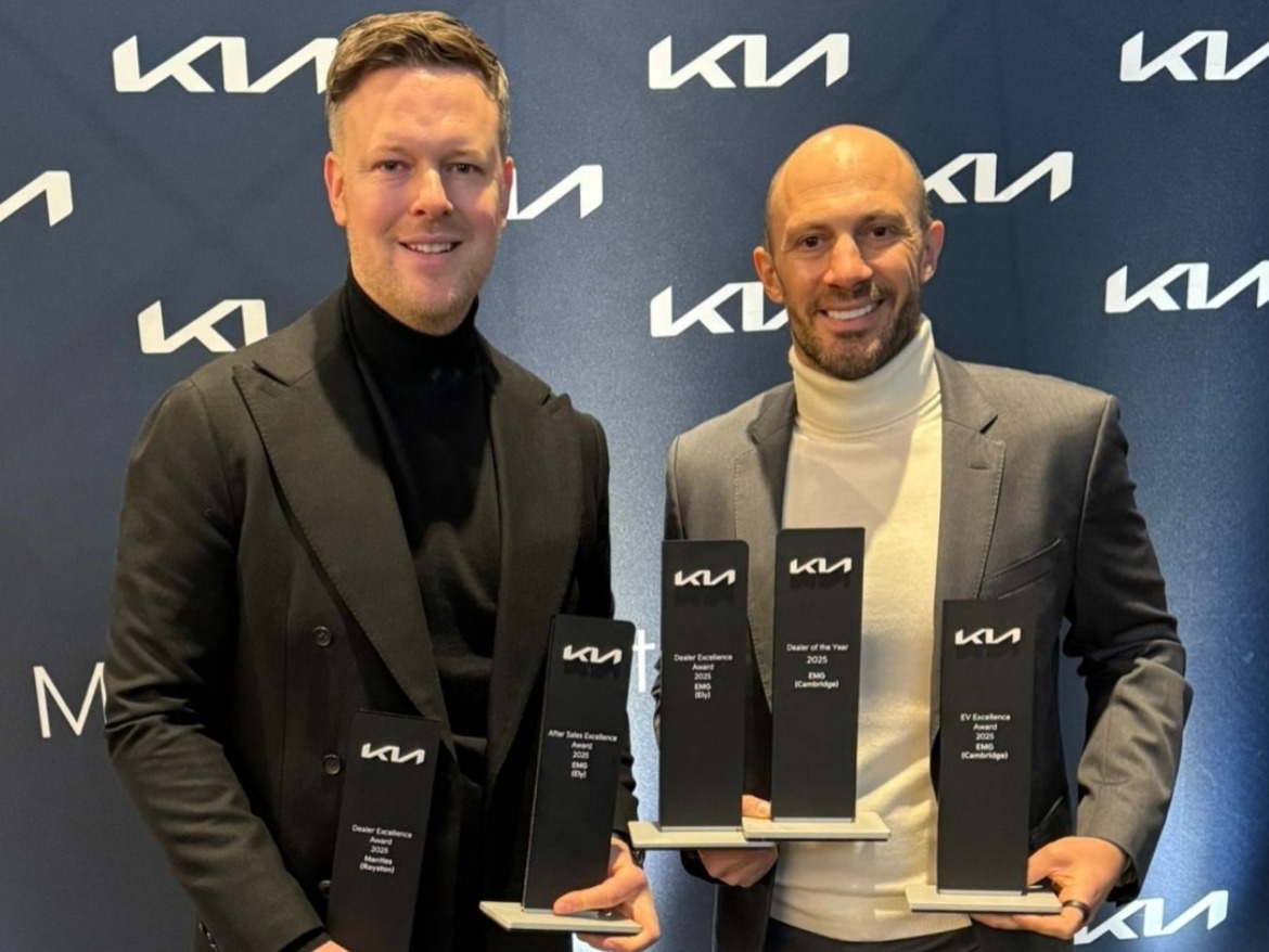 Harry and Neal Grainger with awards from Kia Dealer Excellence Awards 2025